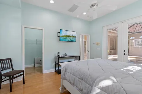 a building outdoor space with patio furniture and a garden