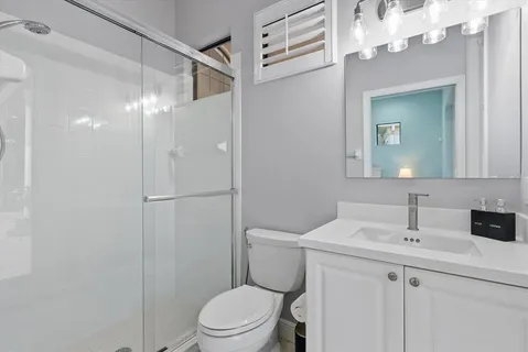 a view of a dinning table and chairs in roof deck