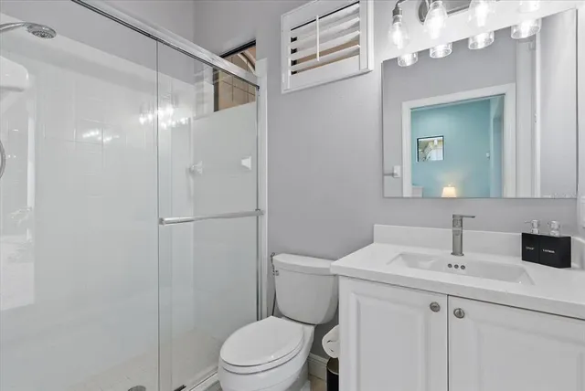 a view of a dinning table and chairs in roof deck