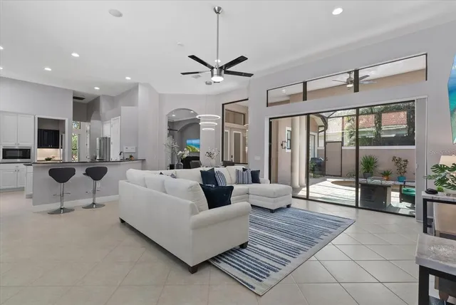 a living room with furniture and a window