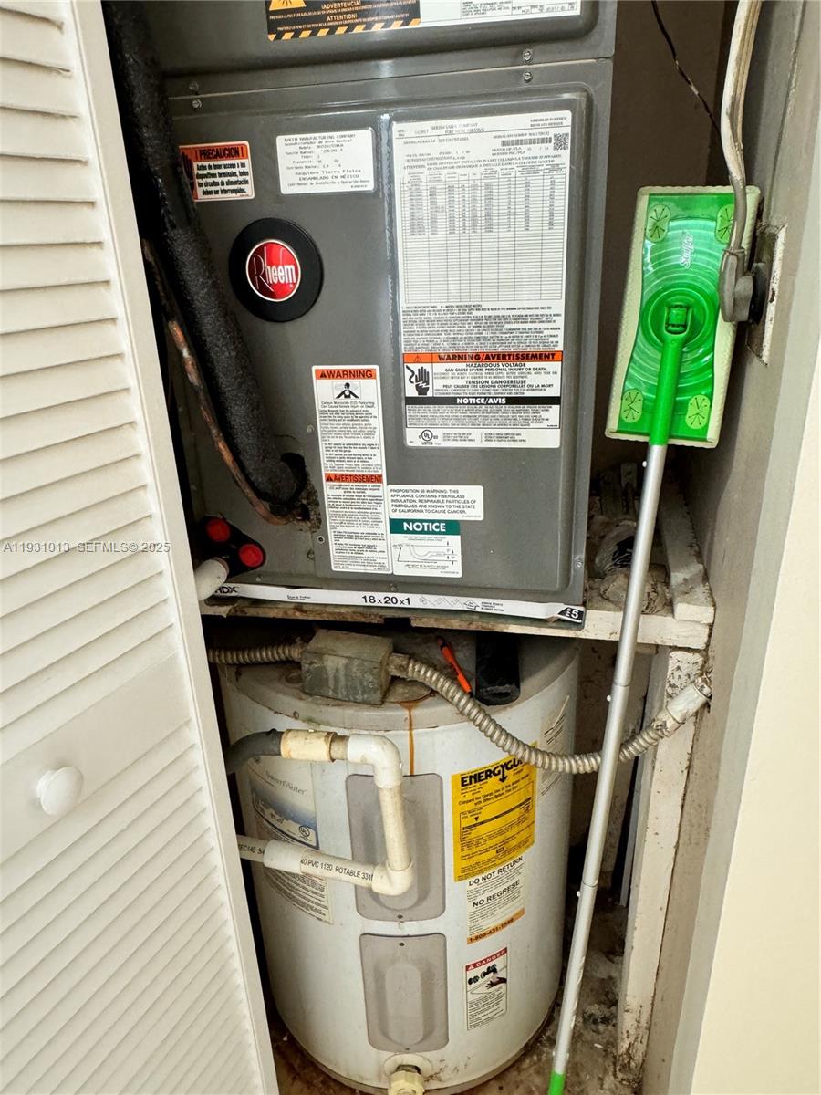 9411 Southwest 4th Street, Unit 111 Miami, FL 33174 - Photo 12 of 28 a view of washer and dryer