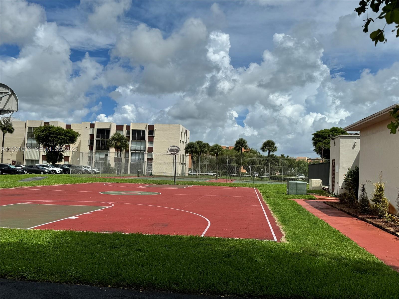 9411 Southwest 4th Street, Unit 111 Miami, FL 33174 - Photo 14 of 28 a view of basketball court