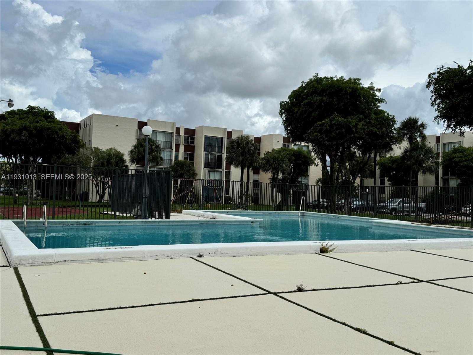 9411 Southwest 4th Street, Unit 111 Miami, FL 33174 - Photo 15 of 28 a view of a backyard