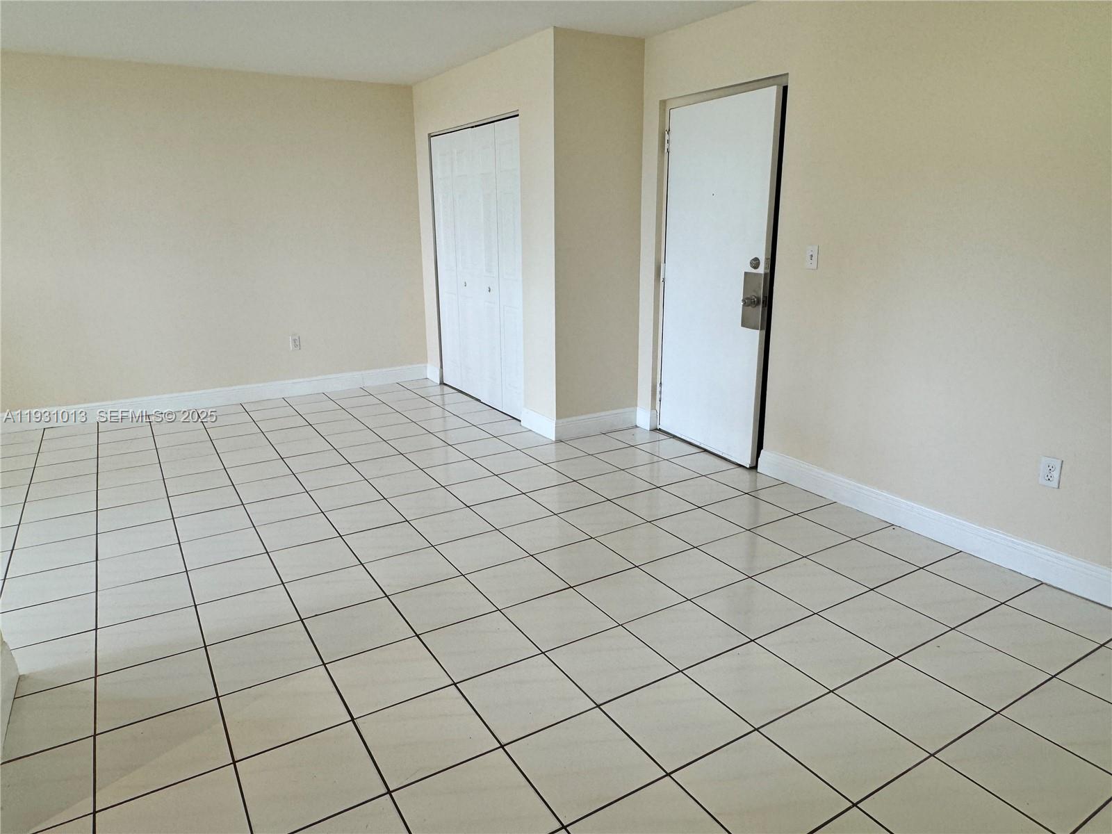 9411 Southwest 4th Street, Unit 111 Miami, FL 33174 - Photo 22 of 28 a view of an empty room and utility room