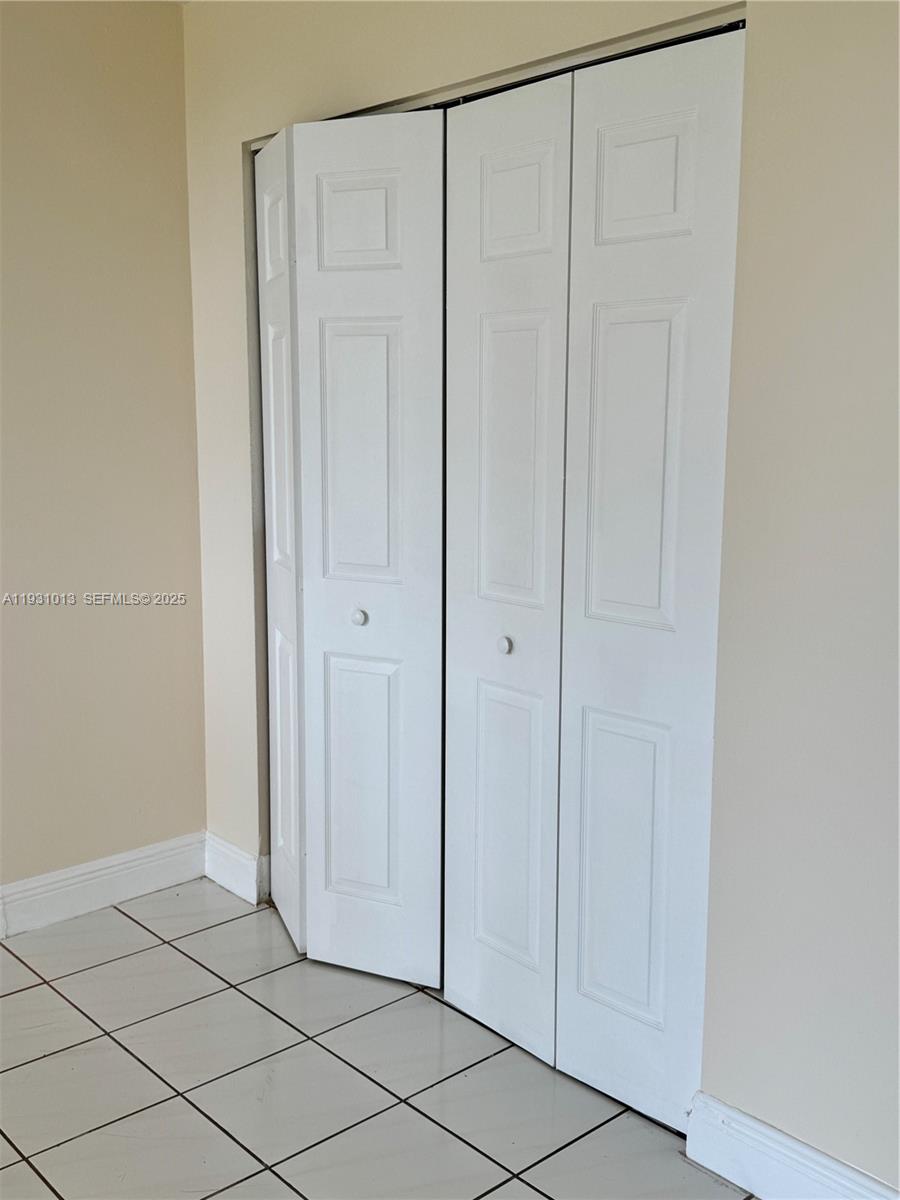 9411 Southwest 4th Street, Unit 111 Miami, FL 33174 - Photo 25 of 28 a view of an empty room