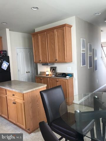 1903 Scaffold Way Odenton, MD 21113 - Photo 3 of 17 Modern kitchen with warm wood accents.