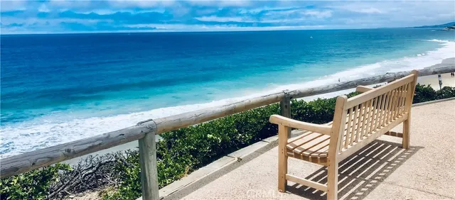 a view of a chair and table on the wooden floor