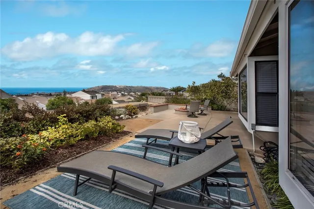 a view of a terrace with furniture
