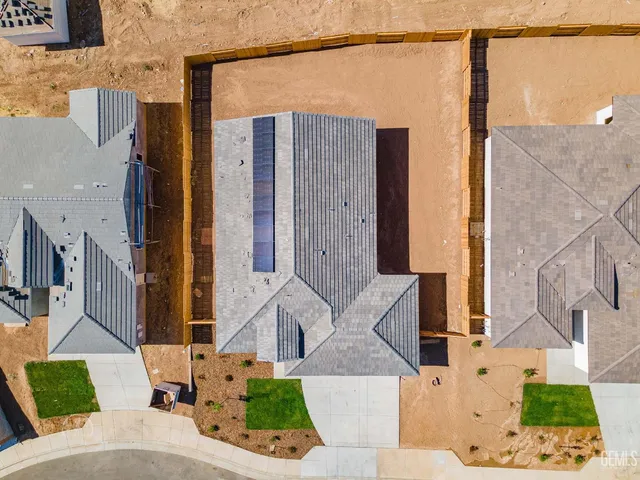 a view of a house with a street