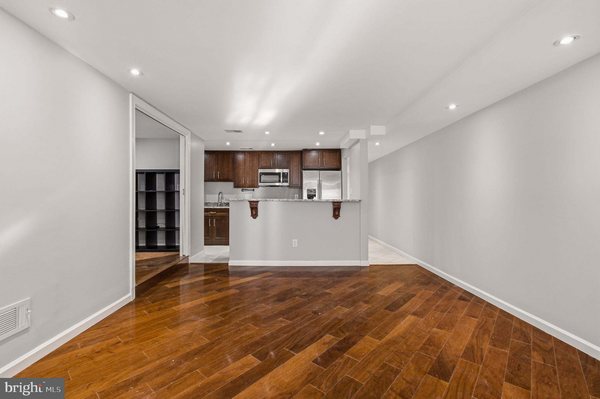 2117 S Street Northwest Washington, DC 20008 - Photo 24 of 63 a view of kitchen with wooden floor and a window