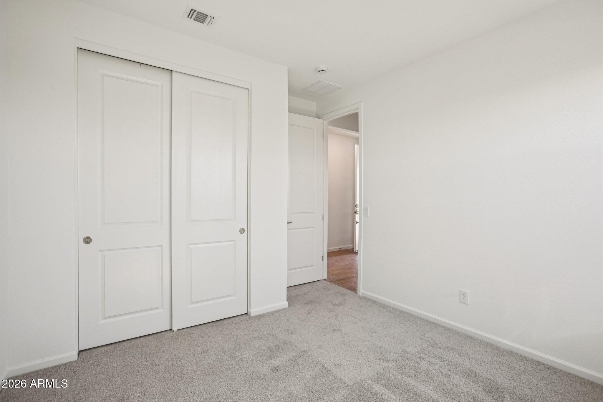 32094 Buckaroo Road San Tan Valley, AZ 85140 - Photo 17 of 46 a view of an empty room
