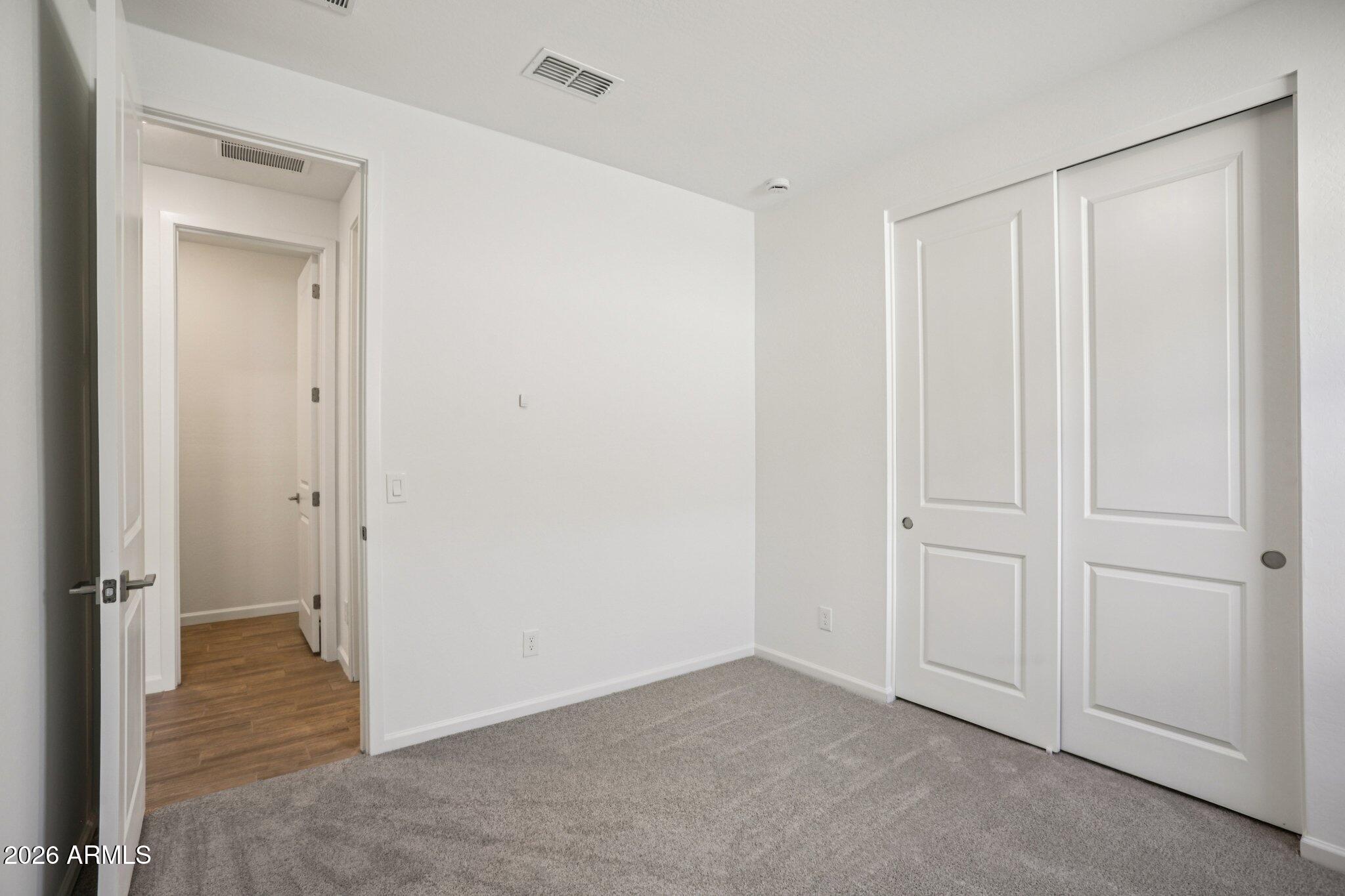32094 Buckaroo Road San Tan Valley, AZ 85140 - Photo 23 of 46 an empty room with closet area