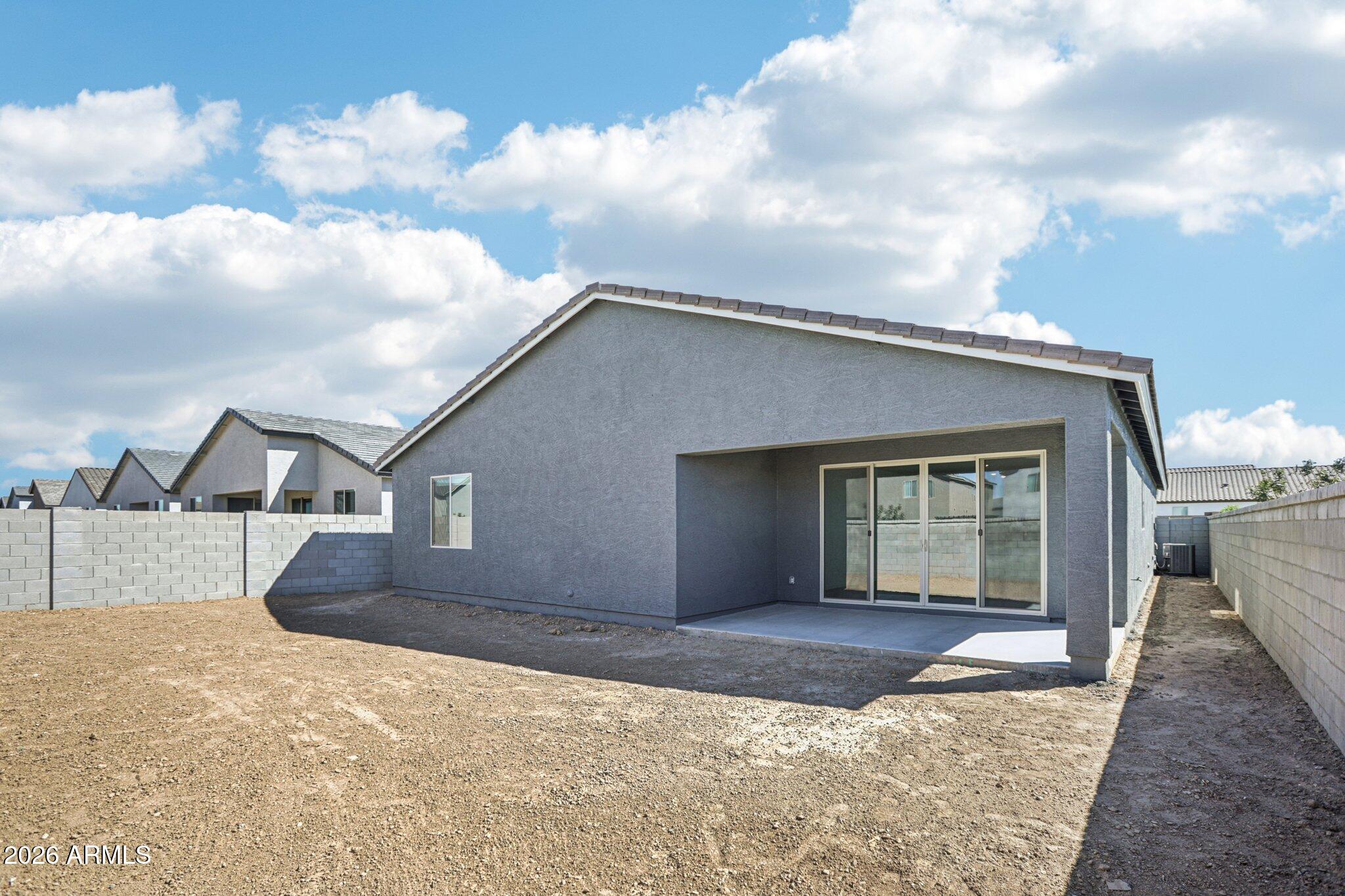 32094 Buckaroo Road San Tan Valley, AZ 85140 - Photo 32 of 46 front view of a house with a yard