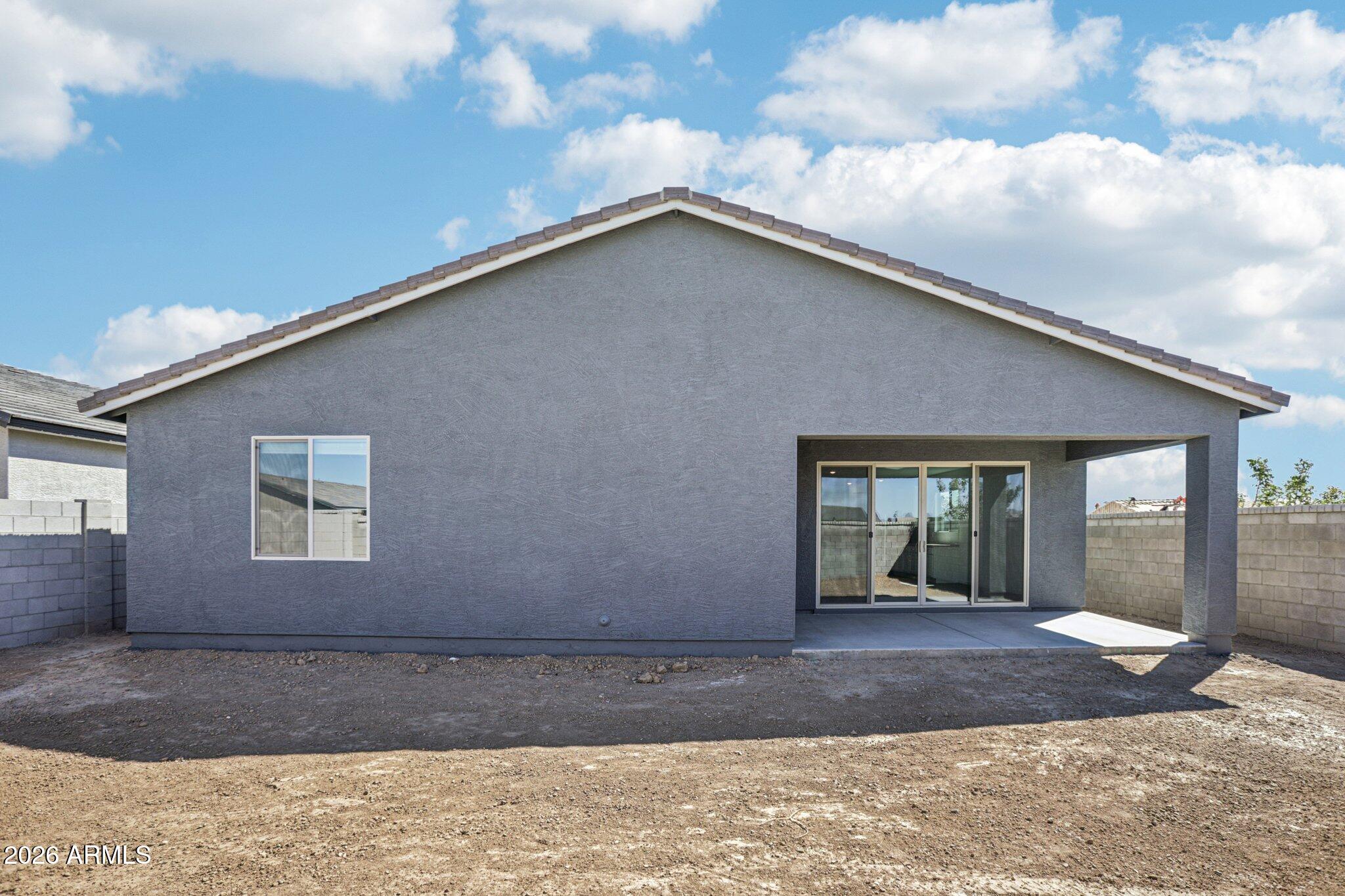 32094 Buckaroo Road San Tan Valley, AZ 85140 - Photo 33 of 46 a view of a house with a yard