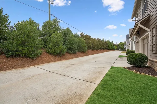 a view of a back yard of the house