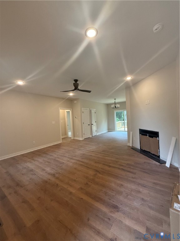20545 Braxton Road Barhamsville, VA 23011 - Photo 5 of 22 a view of an empty room with wooden floor and a window