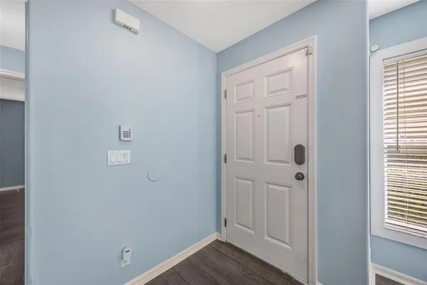 a view of a livingroom with wooden floor