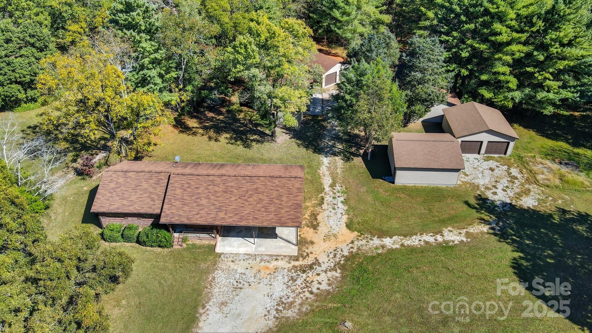 3230 West Innes Street Salisbury, NC 28144 - Photo 3 of 44 a view of a house with a big yard plants and large tree
