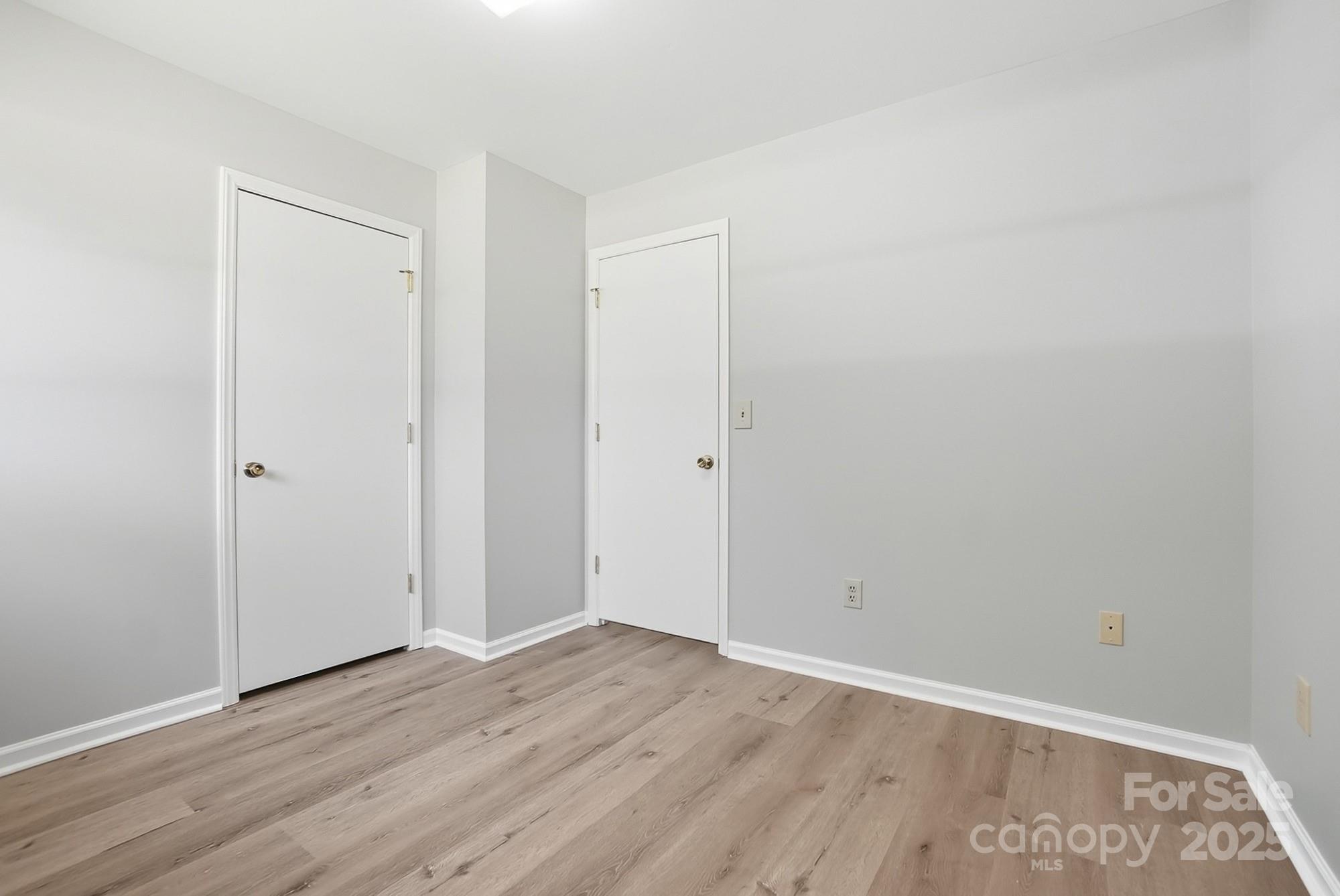 3230 West Innes Street Salisbury, NC 28144 - Photo 35 of 44 a view of an empty room with wooden floor