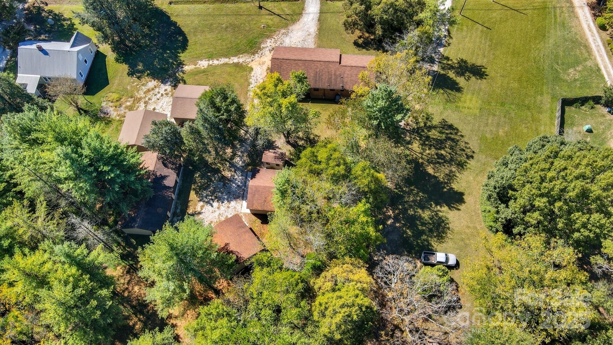 3230 West Innes Street Salisbury, NC 28144 - Photo 4 of 44 an aerial view of residential house with outdoor space and trees all around