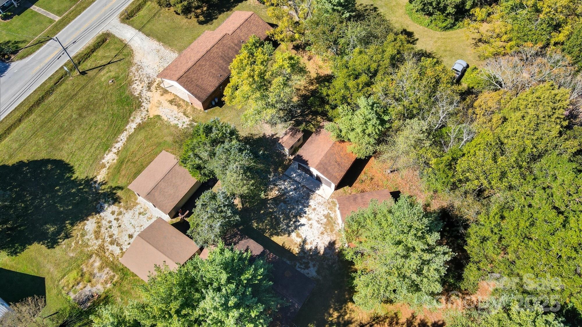 3230 West Innes Street Salisbury, NC 28144 - Photo 5 of 44 an aerial view of residential house with outdoor space and trees all around