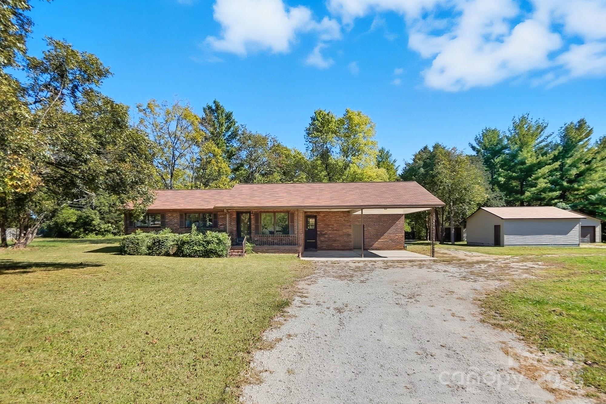 3230 West Innes Street Salisbury, NC 28144 - Photo 7 of 44 a view of a house with backyard and sitting area