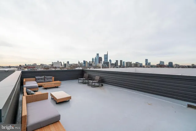a view of city and a tall buildings