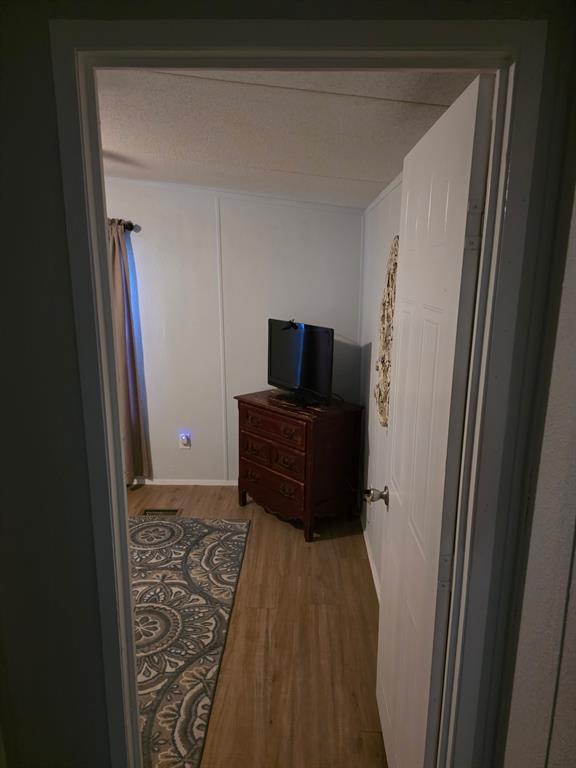 115 Yates Circle Aledo, TX 76008 - Photo 12 of 31 a living room with furniture and a flat screen tv