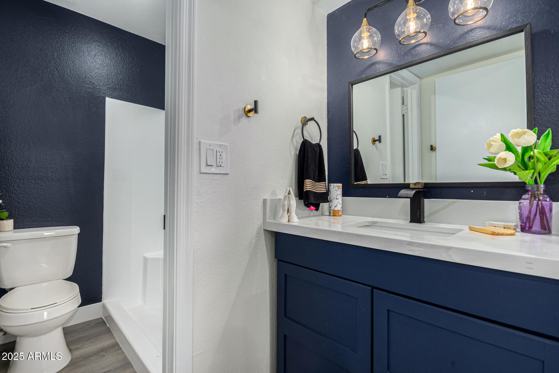 623 West Guadalupe Road, Unit 254 Mesa, AZ 85210 - Photo 12 of 30 a bathroom with a sink and a mirror