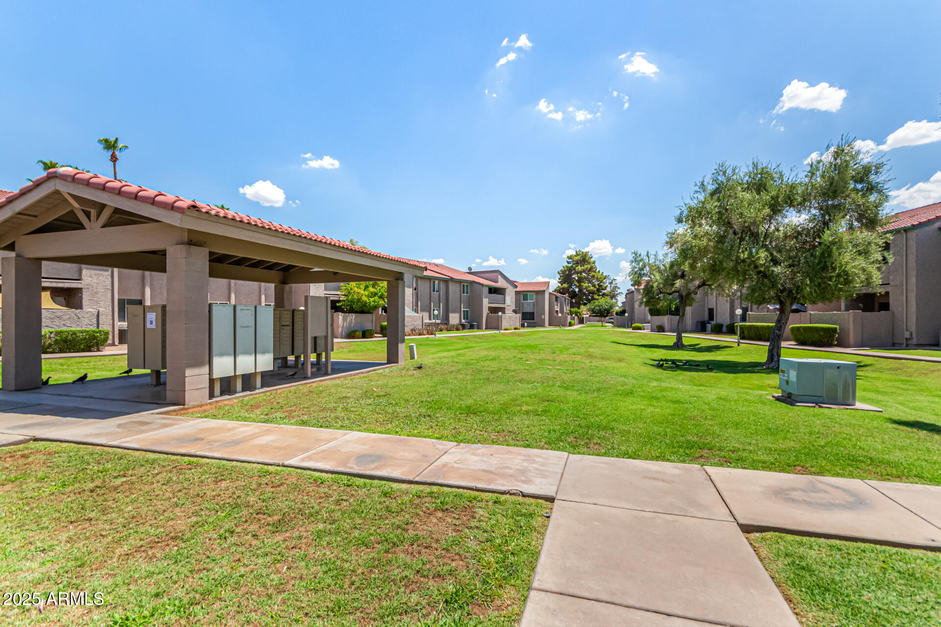 623 West Guadalupe Road, Unit 254 Mesa, AZ 85210 - Photo 24 of 30 a front view of house with yard and green space