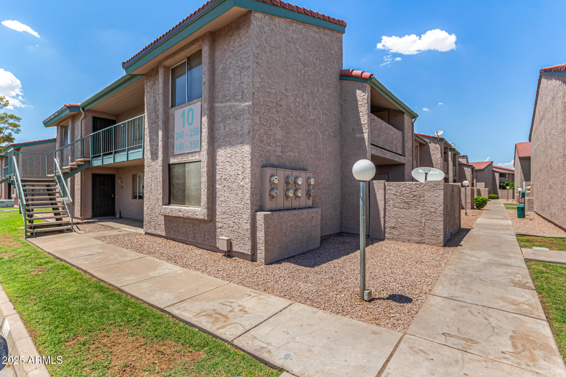 623 West Guadalupe Road, Unit 254 Mesa, AZ 85210 - Photo 28 of 30 a front view of a house with yard