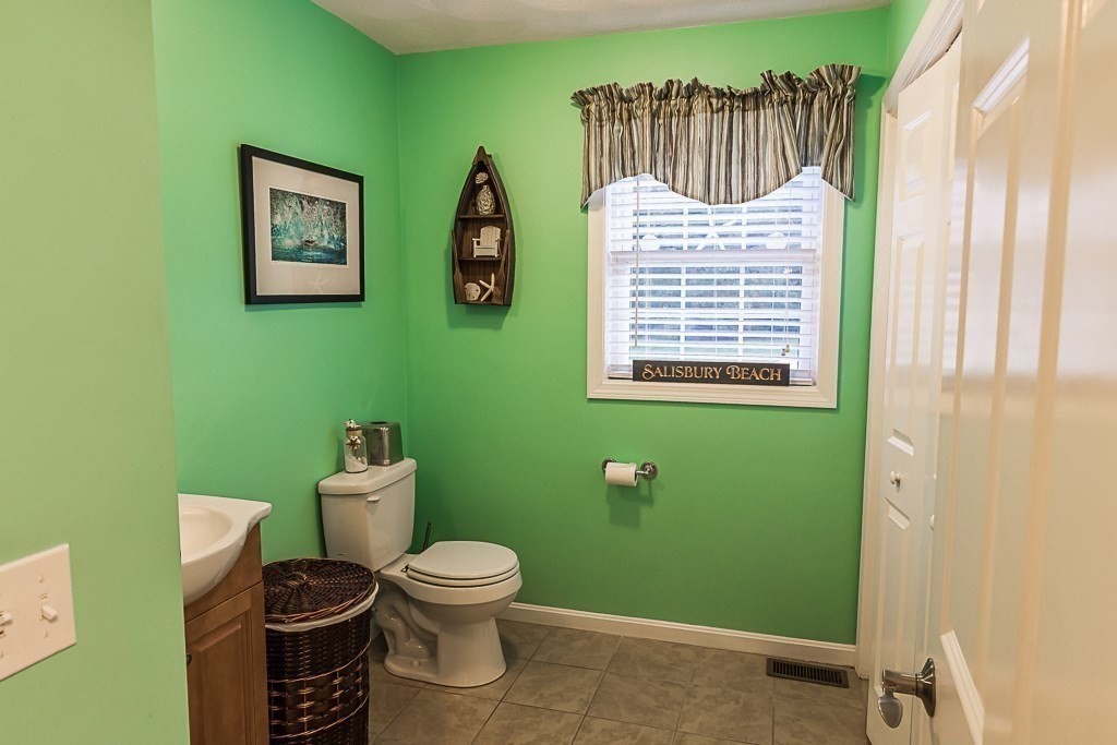 77 Baker Road Salisbury, MA 01952 - Photo 23 of 42 a bathroom with a toilet and a sink