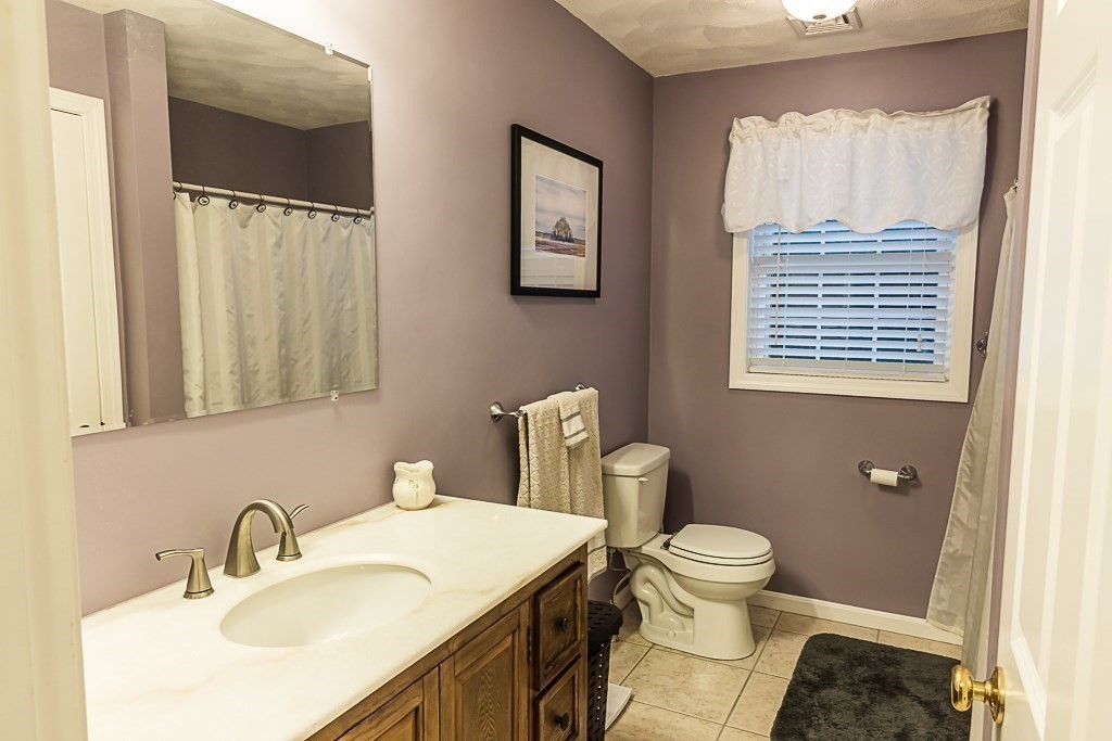 77 Baker Road Salisbury, MA 01952 - Photo 33 of 42 a bathroom with a sink a toilet and shower