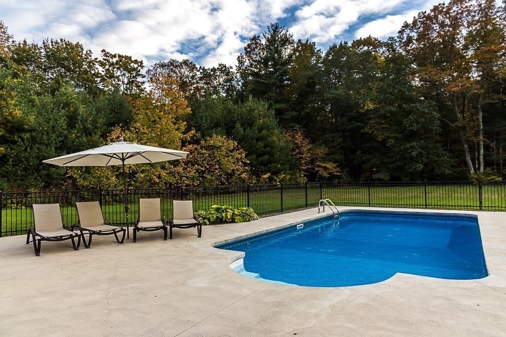 77 Baker Road Salisbury, MA 01952 - Photo 7 of 42 a view of a swimming pool with a patio