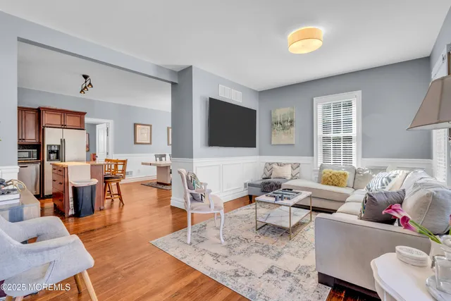 a view of a hall with furniture