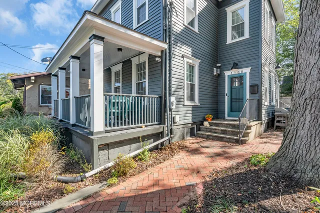 a front view of a house with patio
