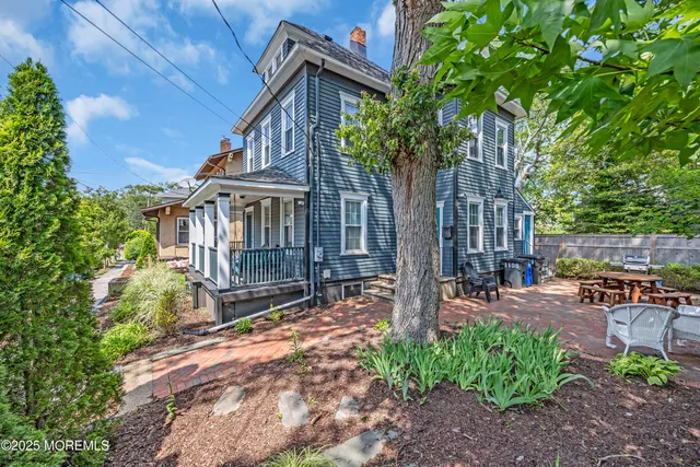 a view of kitchen with cabinets and wooden floor