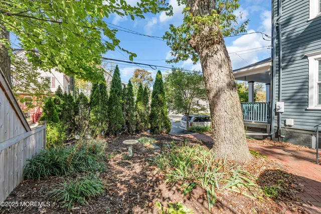a kitchen with granite countertop stainless steel appliances and wooden cabinets