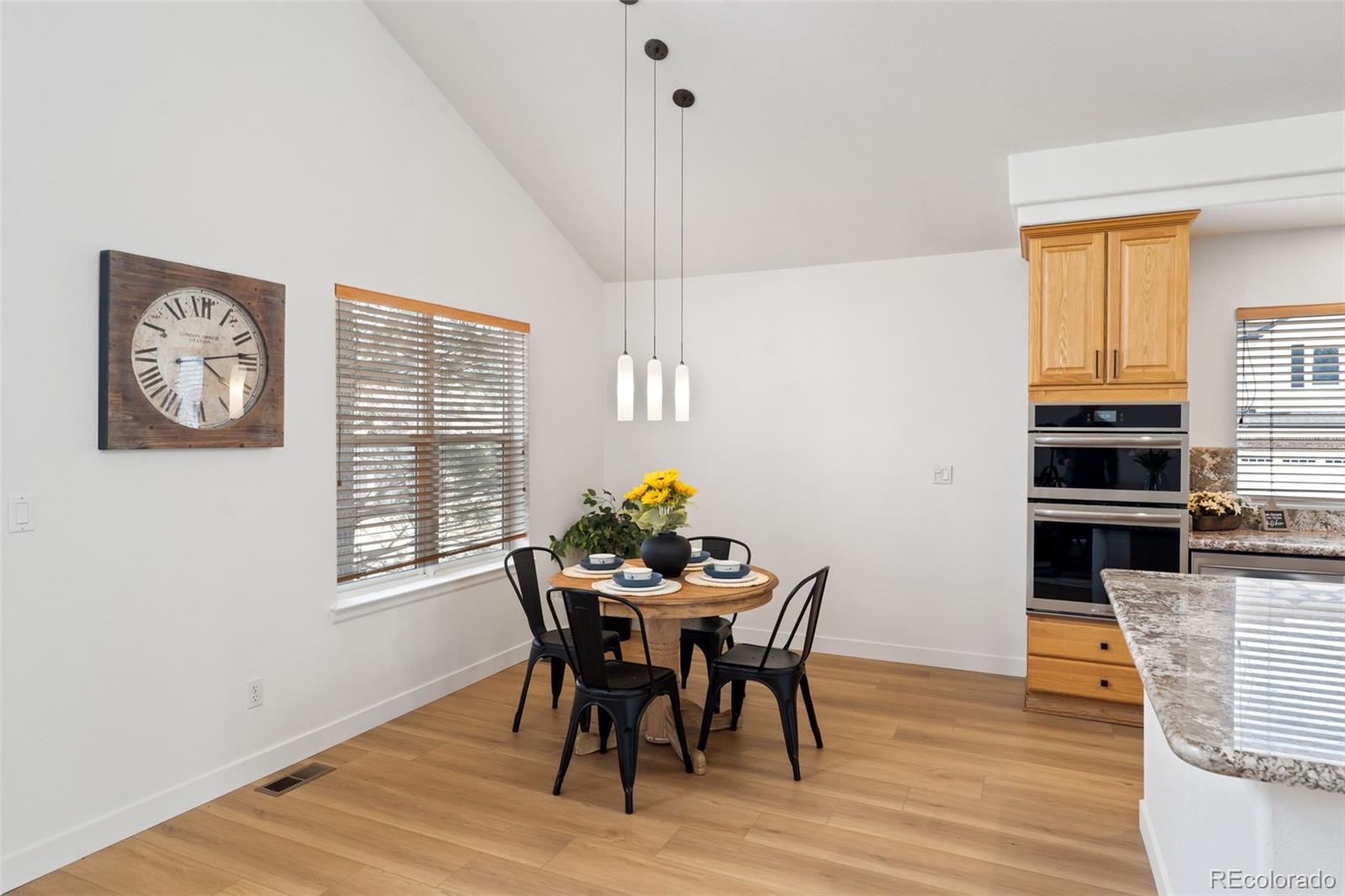 9838 Cypress Point Circle Lone Tree, CO 80124 - Photo 15 of 50 a dining room with furniture and window