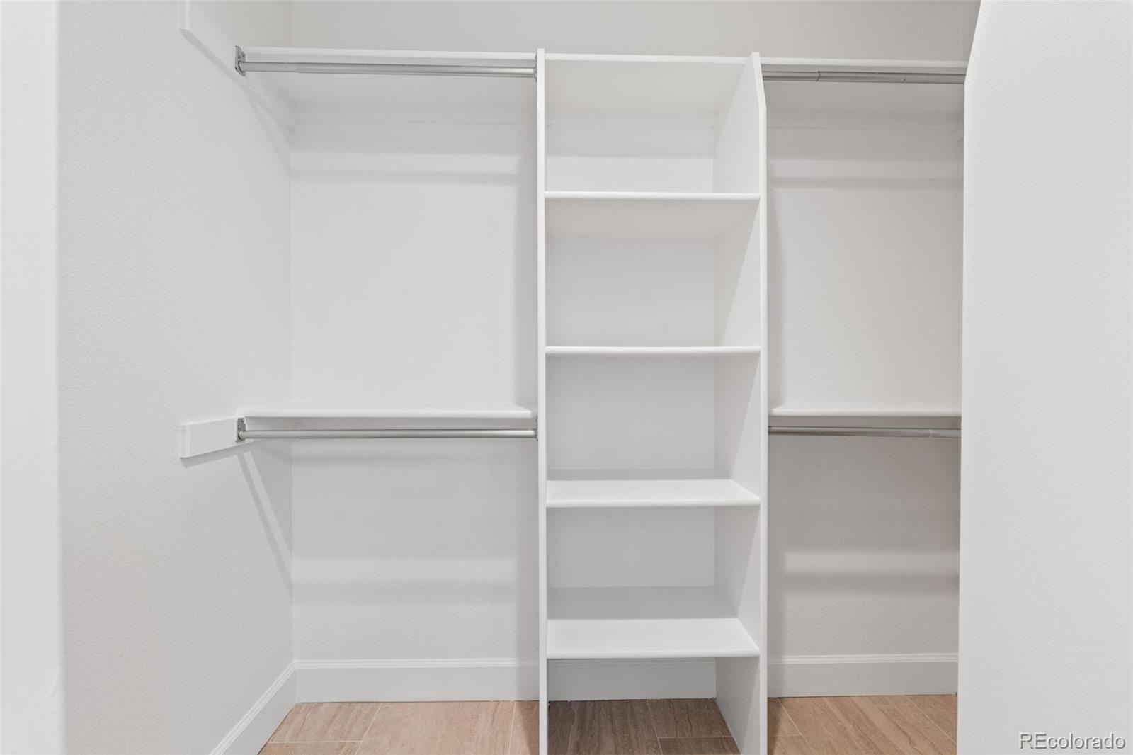 9838 Cypress Point Circle Lone Tree, CO 80124 - Photo 29 of 50 a view of an empty walk in closet