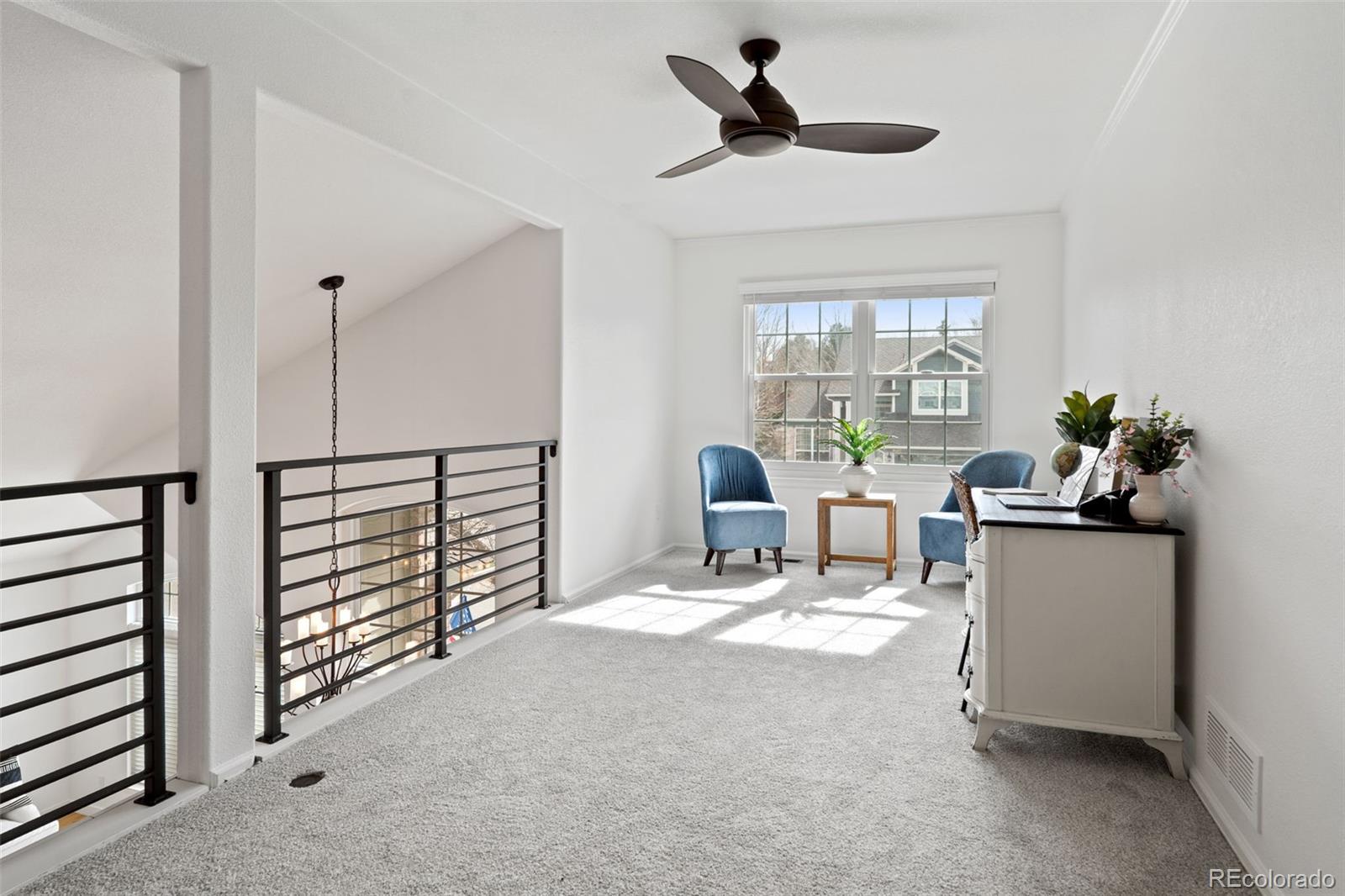 9838 Cypress Point Circle Lone Tree, CO 80124 - Photo 32 of 50 a living room with furniture