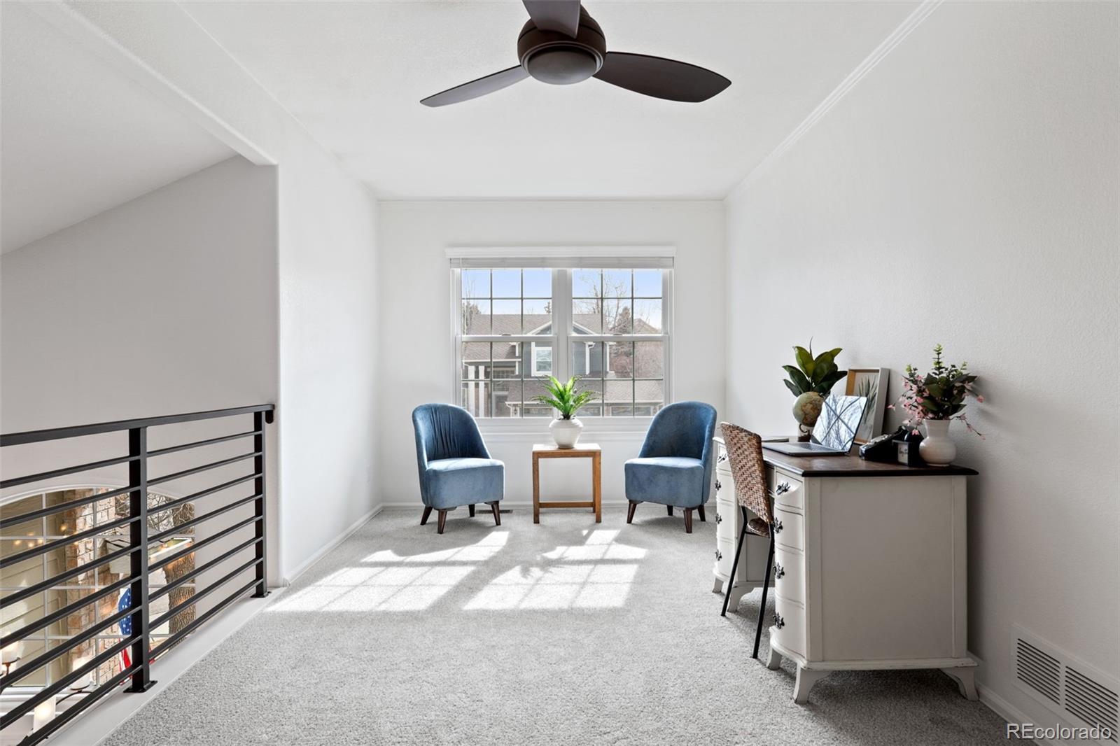 9838 Cypress Point Circle Lone Tree, CO 80124 - Photo 34 of 50 a view of a workspace with furniture and a window