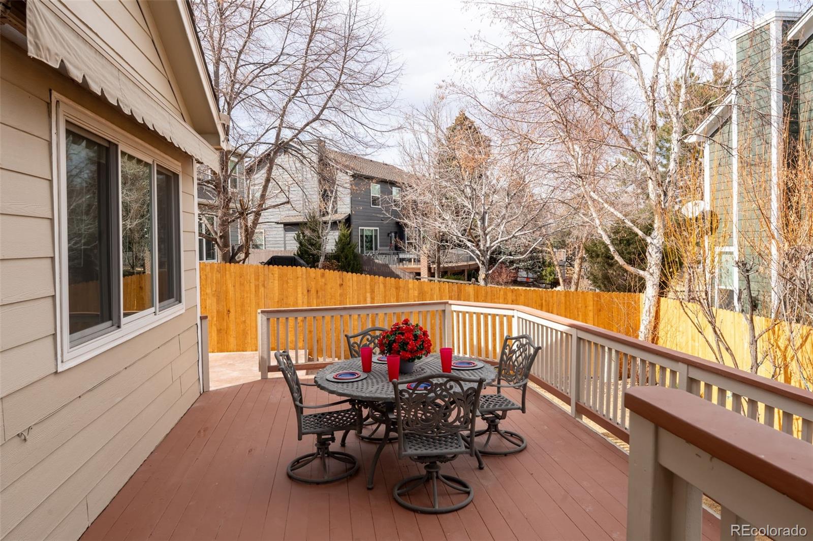 9838 Cypress Point Circle Lone Tree, CO 80124 - Photo 42 of 50 a view of outdoor seating space with furniture and wooden floor