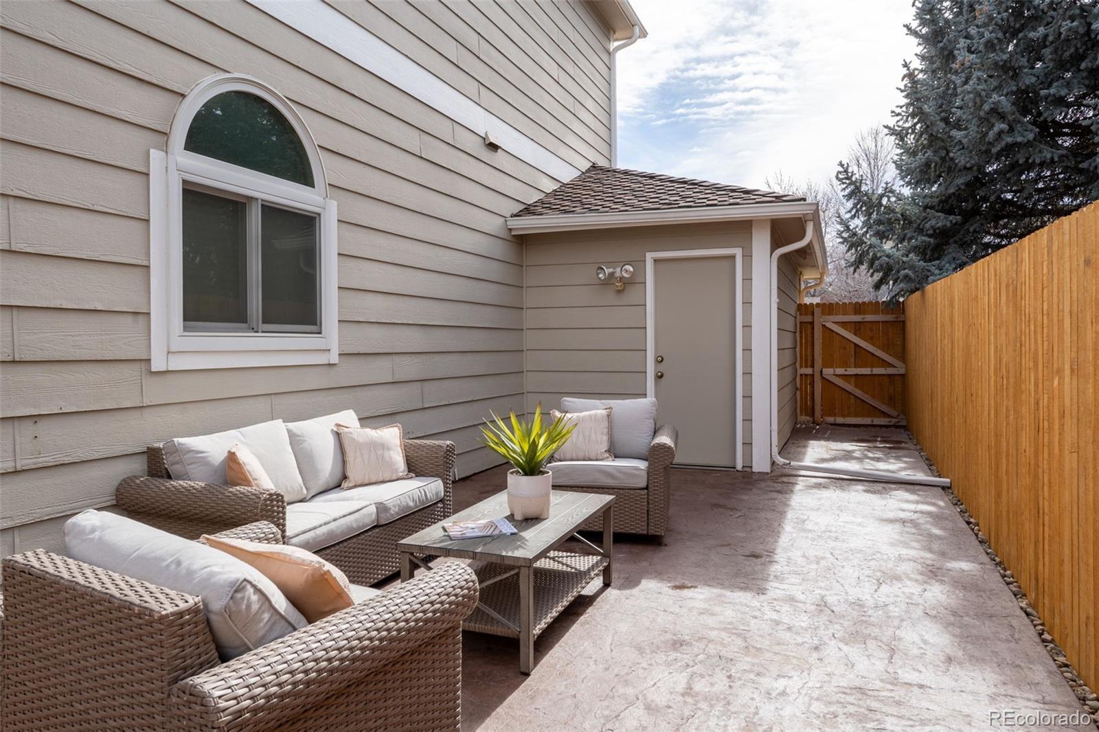 9838 Cypress Point Circle Lone Tree, CO 80124 - Photo 43 of 50 a view of backyard with seating space