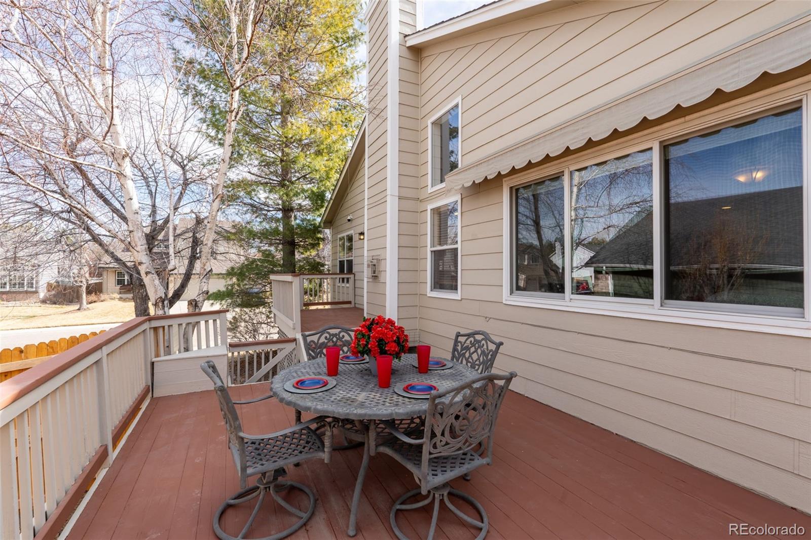 9838 Cypress Point Circle Lone Tree, CO 80124 - Photo 45 of 50 a view of a patio with furniture and a potted plant