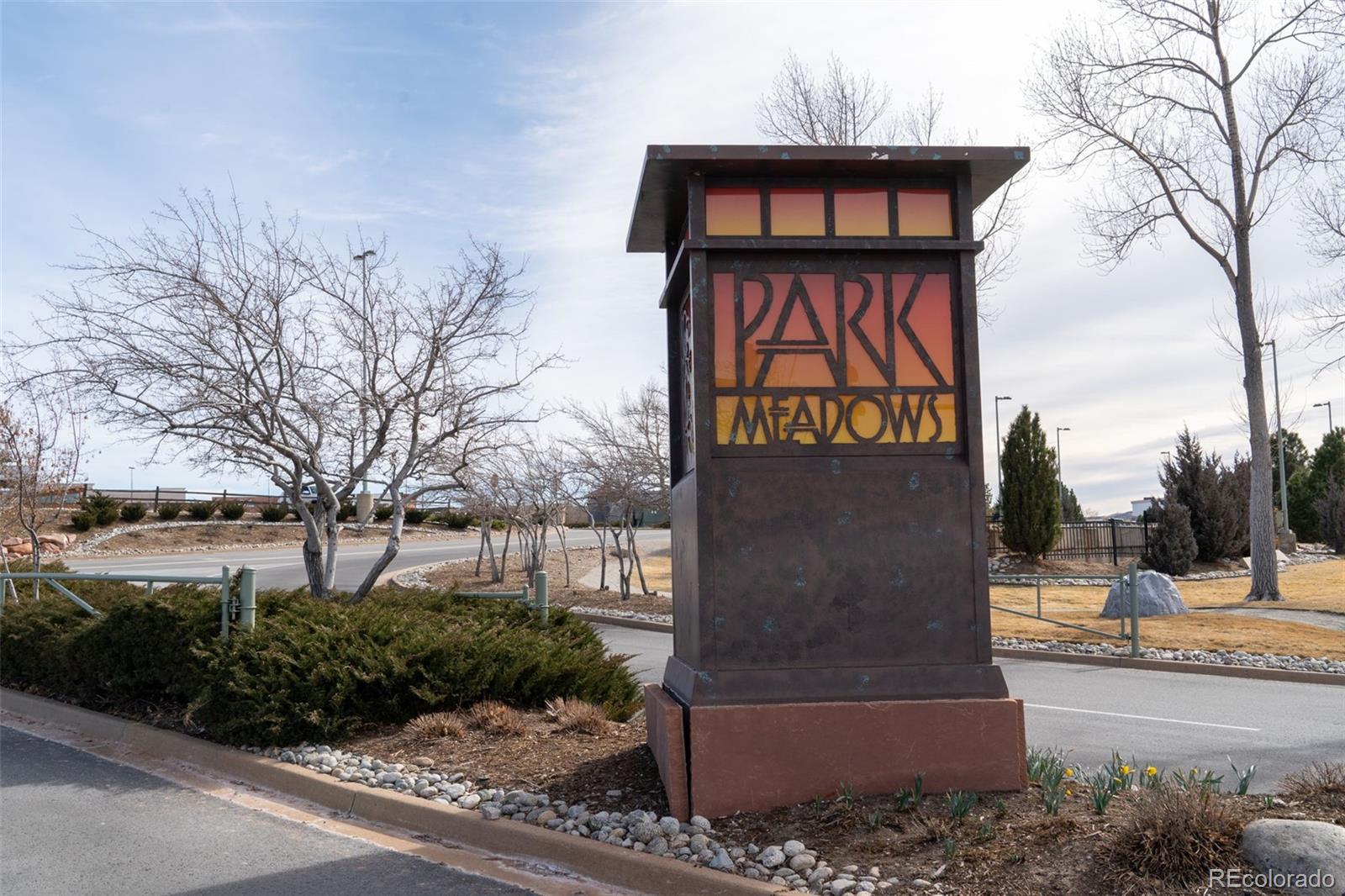 9838 Cypress Point Circle Lone Tree, CO 80124 - Photo 49 of 50 a sign board on the side of a road