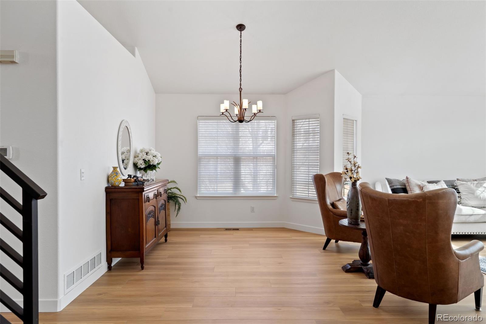 9838 Cypress Point Circle Lone Tree, CO 80124 - Photo 8 of 50 a dining room with furniture and window