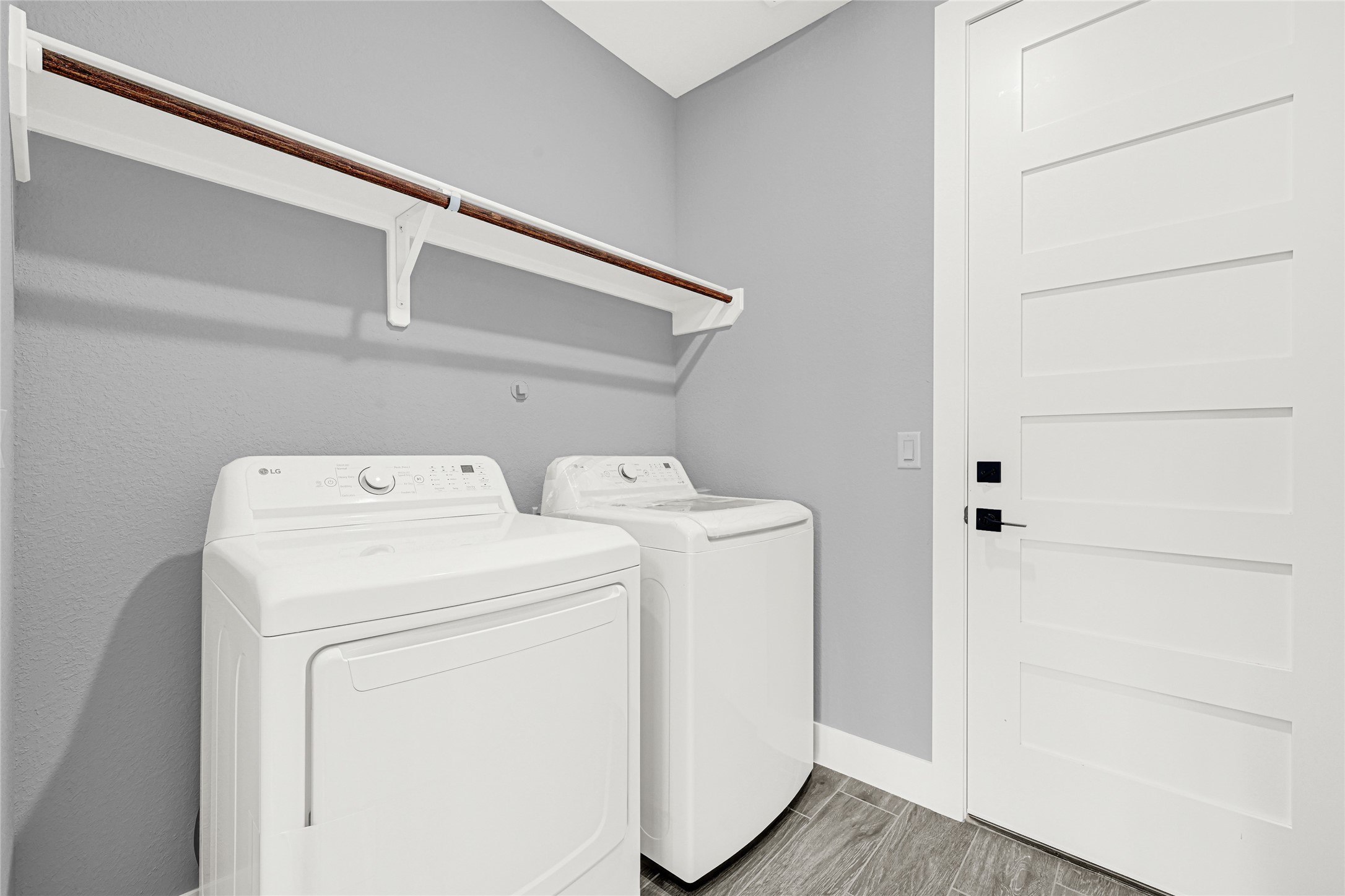 515 Fairfax Lane Conroe, TX 77303 - Photo 17 of 26 a utility room with dryer and washer