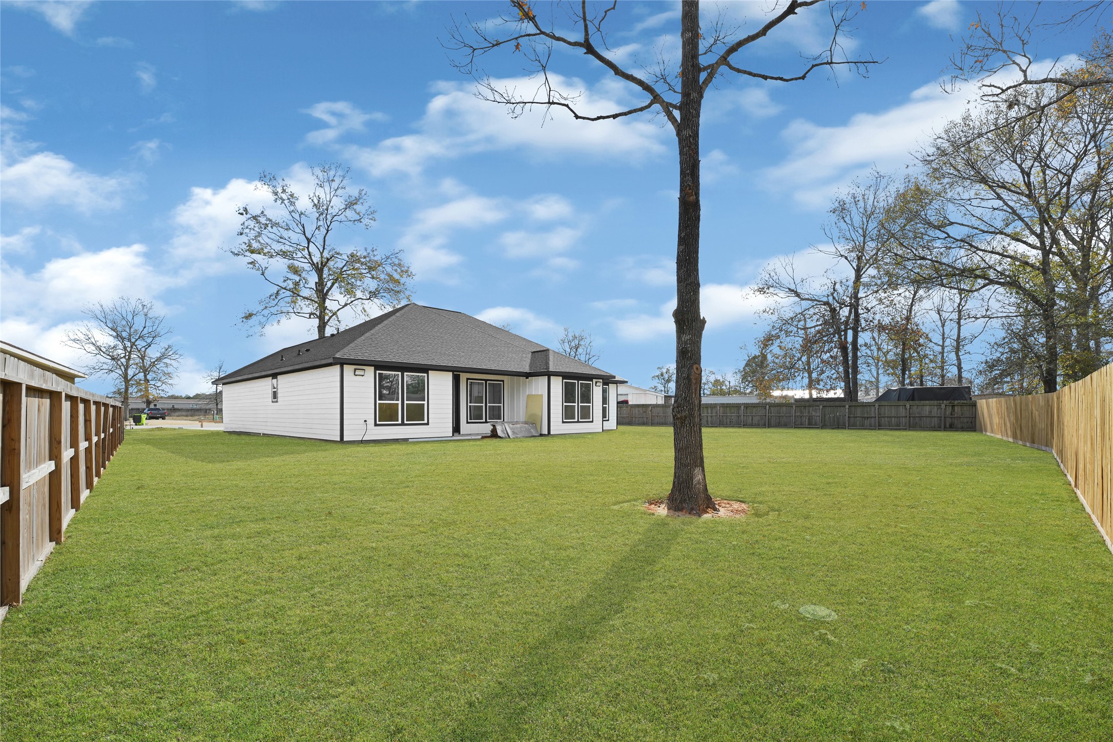 515 Fairfax Lane Conroe, TX 77303 - Photo 25 of 26 a house view with garden space