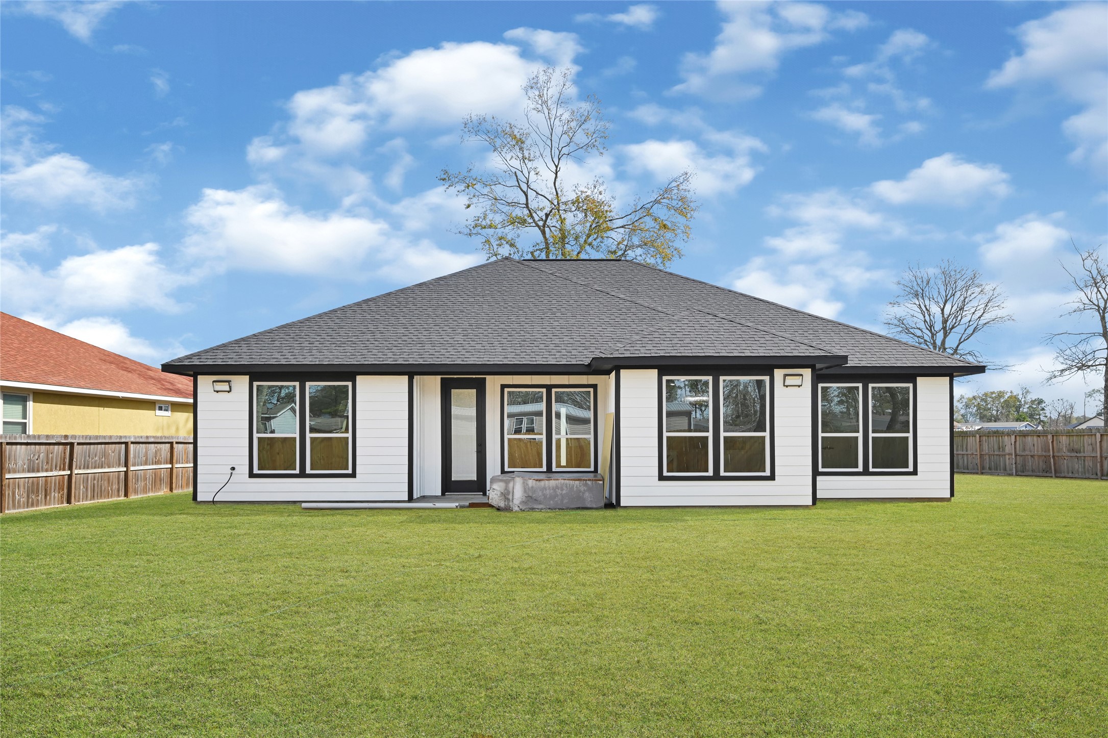 515 Fairfax Lane Conroe, TX 77303 - Photo 26 of 26 a big house with a garden view